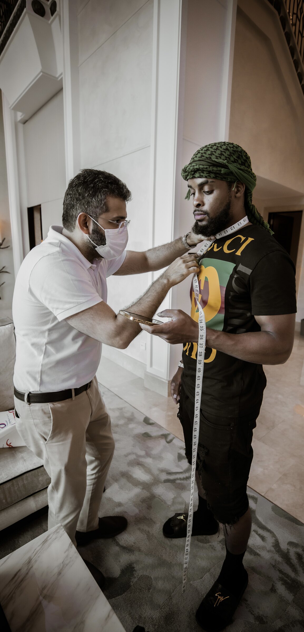 Zi Morris, American entrepreneur and SaaS tech founder, at a bespoke suit fitting in Dubai