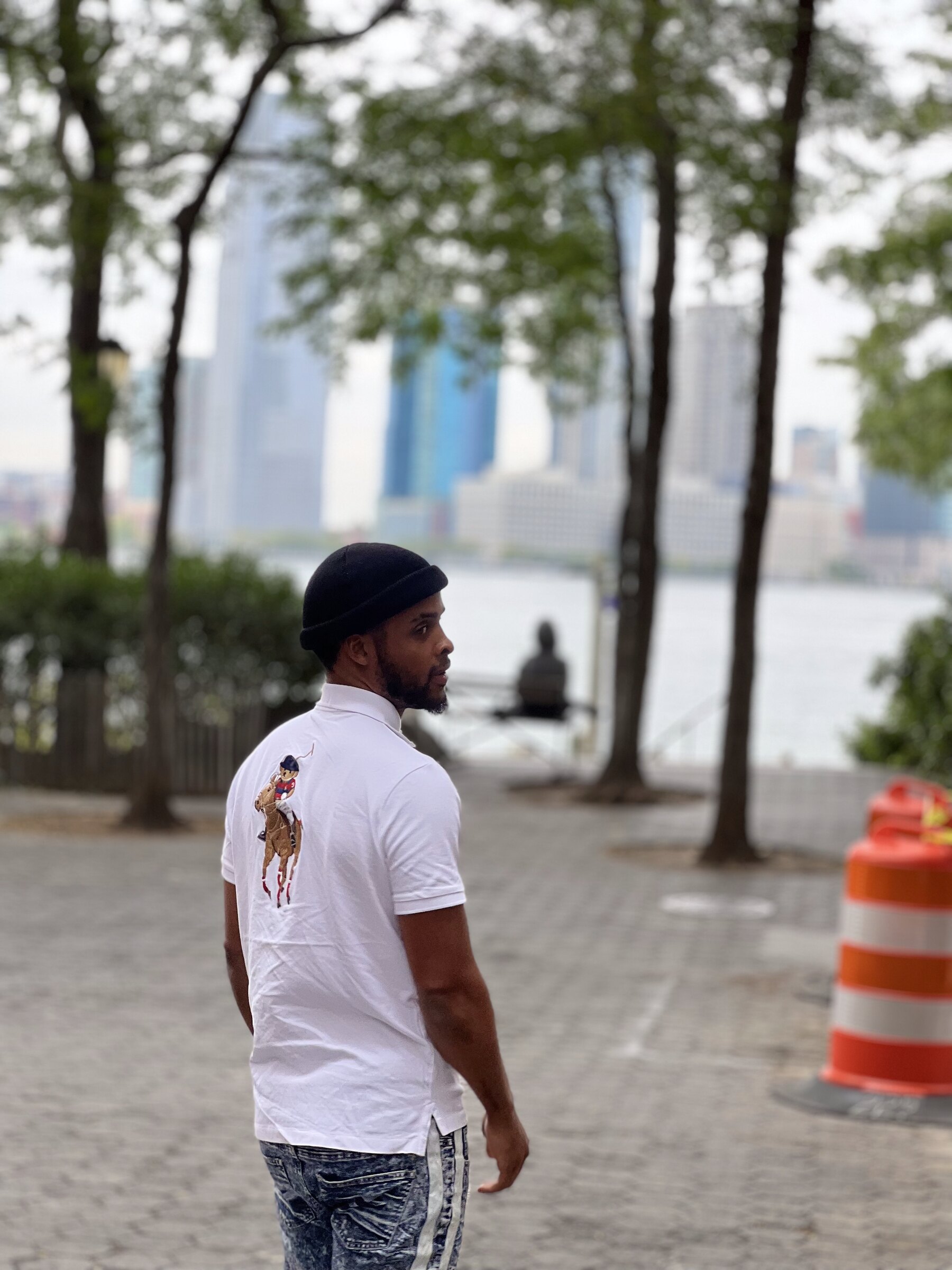 Zi Morris, American entrepreneur and SaaS tech founder, on the New York City waterfront