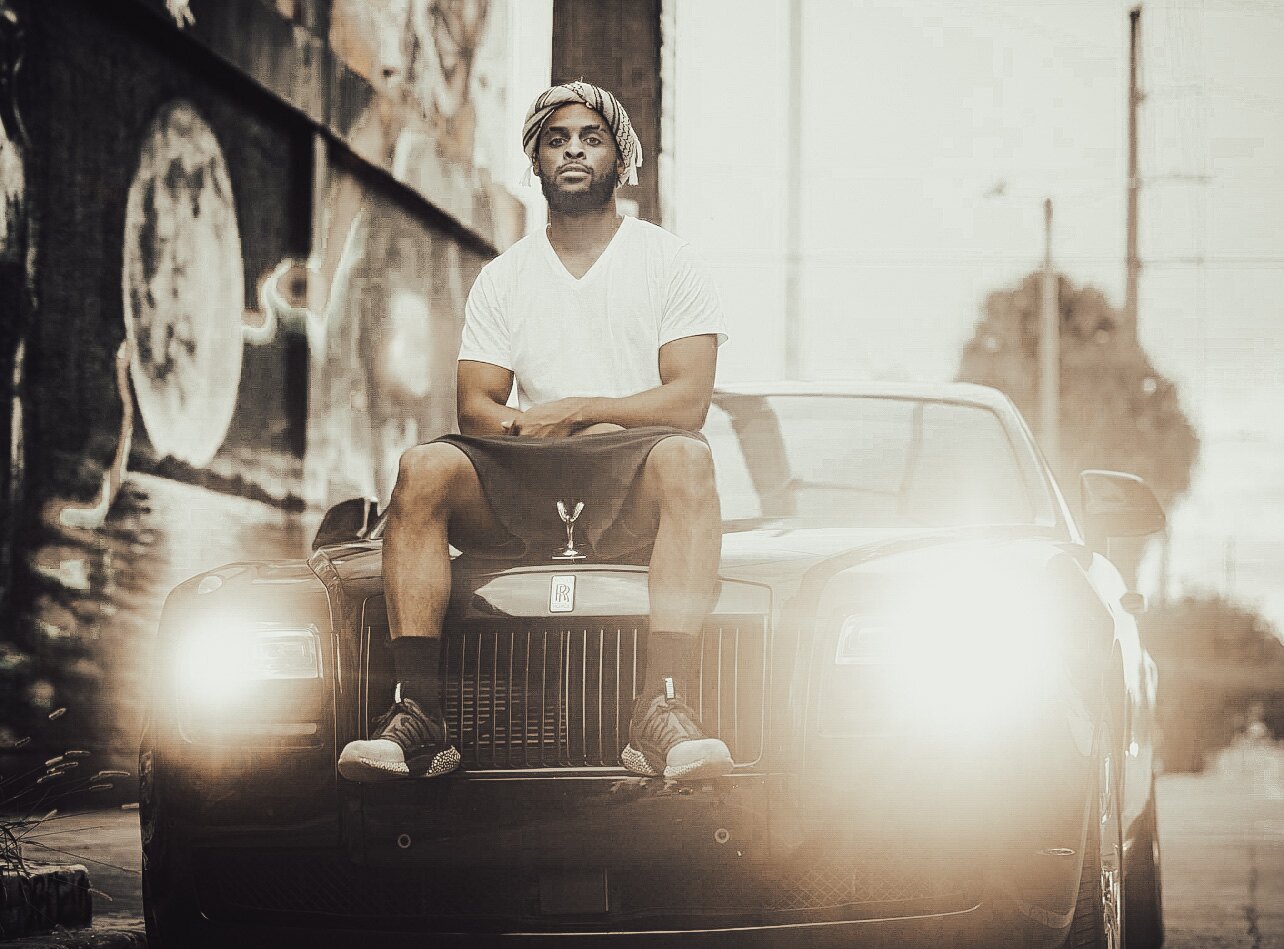 Zi Morris, American entrepreneur and investor, with a Rolls-Royce