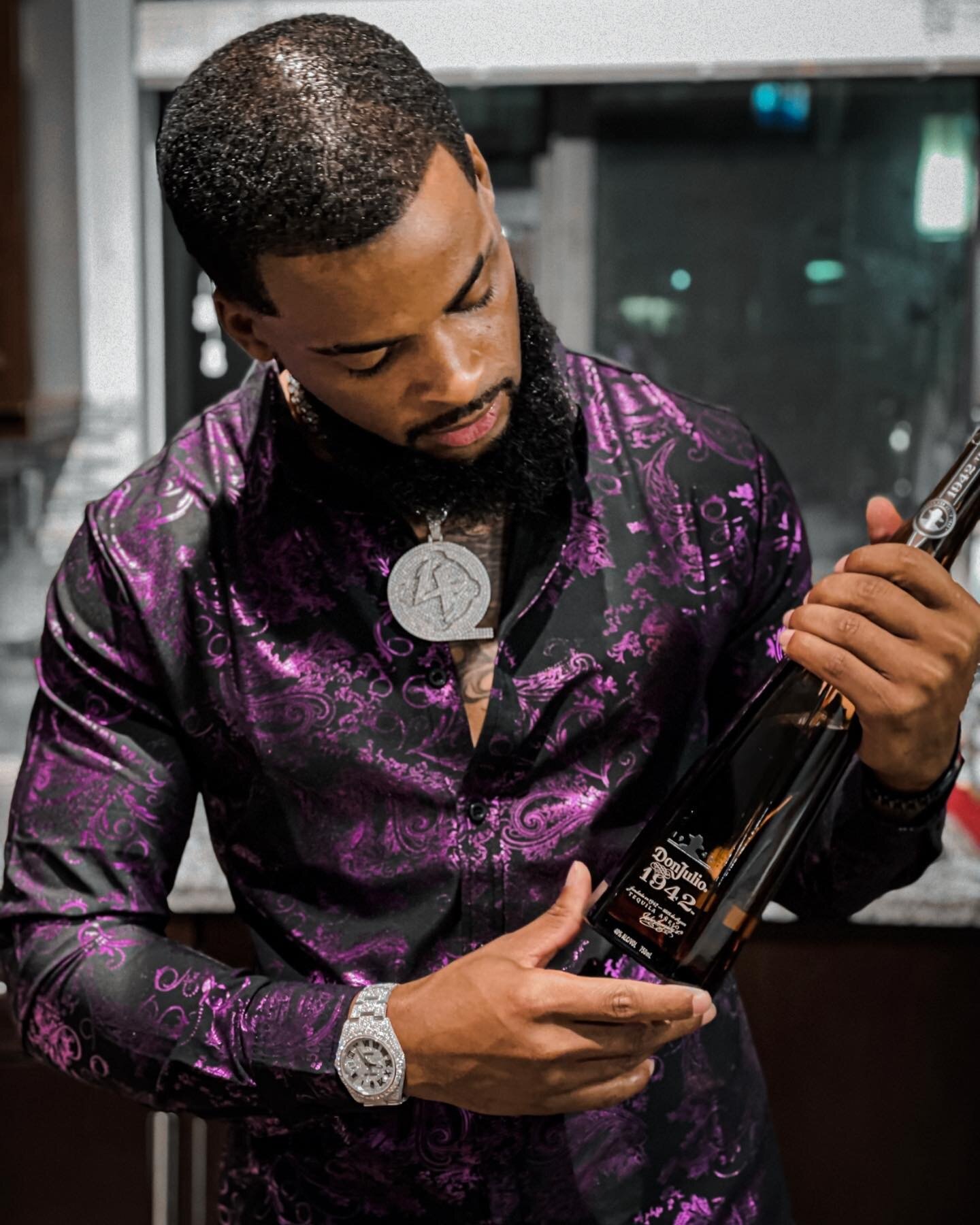 Zi Morris (Zi4reel), American entrepreneur and SaaS tech founder, with a premium tequila at a lounge