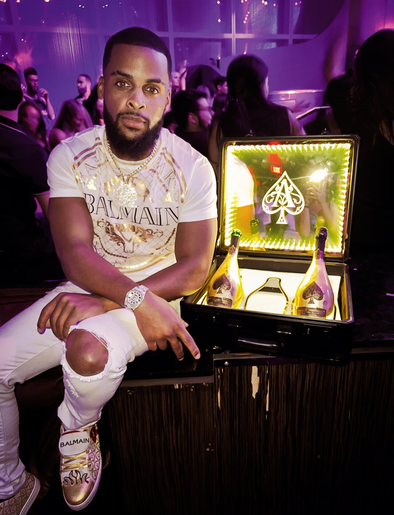 Zi Morris (Zi4reel), American entrepreneur and SaaS tech founder, at a VIP nightclub table